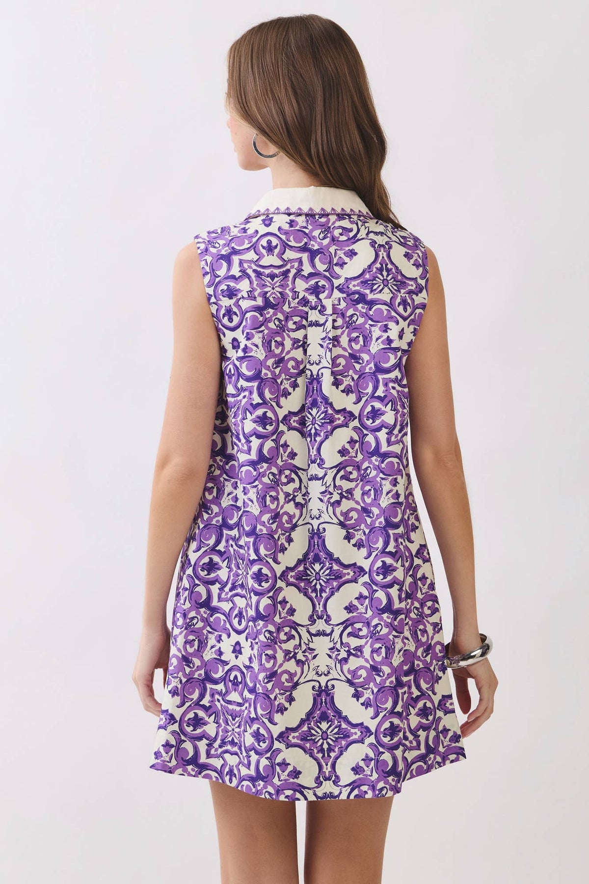 Back view of purple tile-print collared mini dress