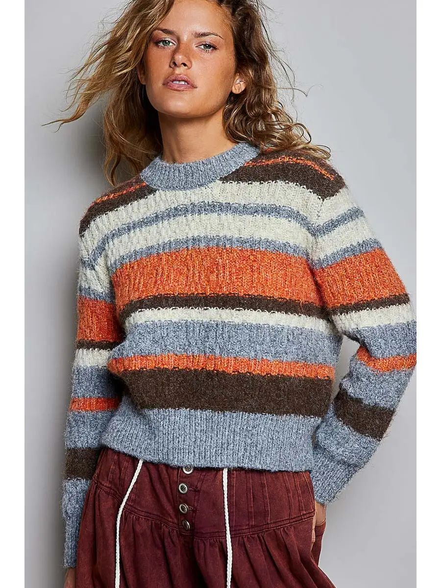 Chunky multicolor striped crew sweater on model, front view