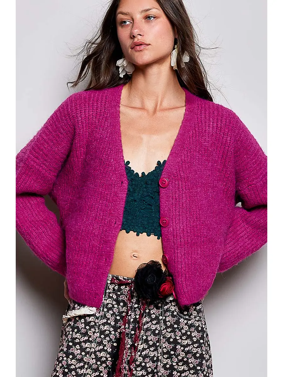 Pink V-neck button-front cardigan on model, front view