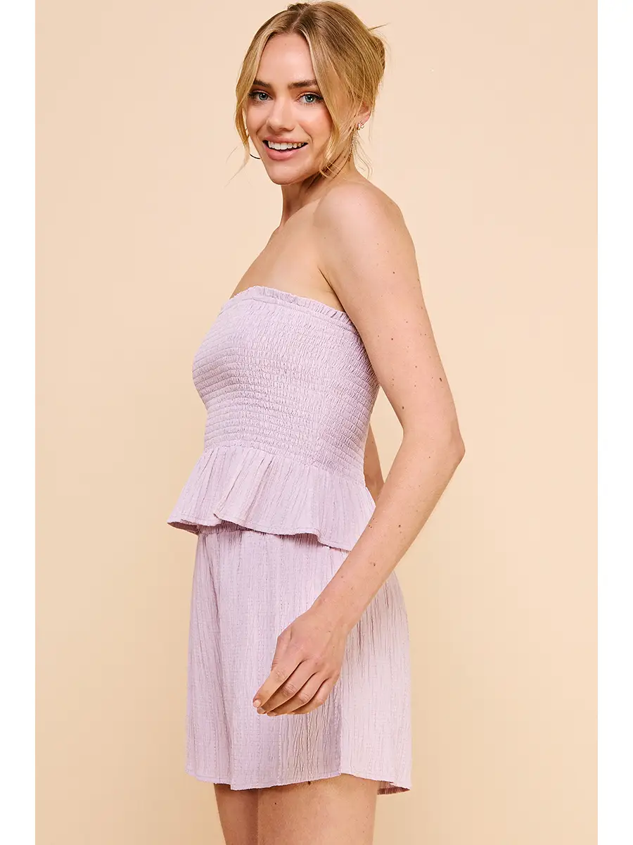 TEXTURED SMOCKED STRAPLESS PEPLUM TOP