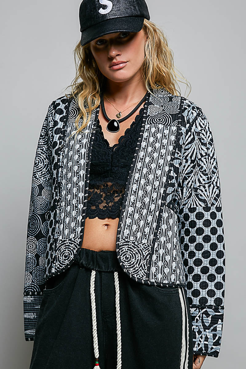 Black and ivory patchwork quilted kimono jacket, front view