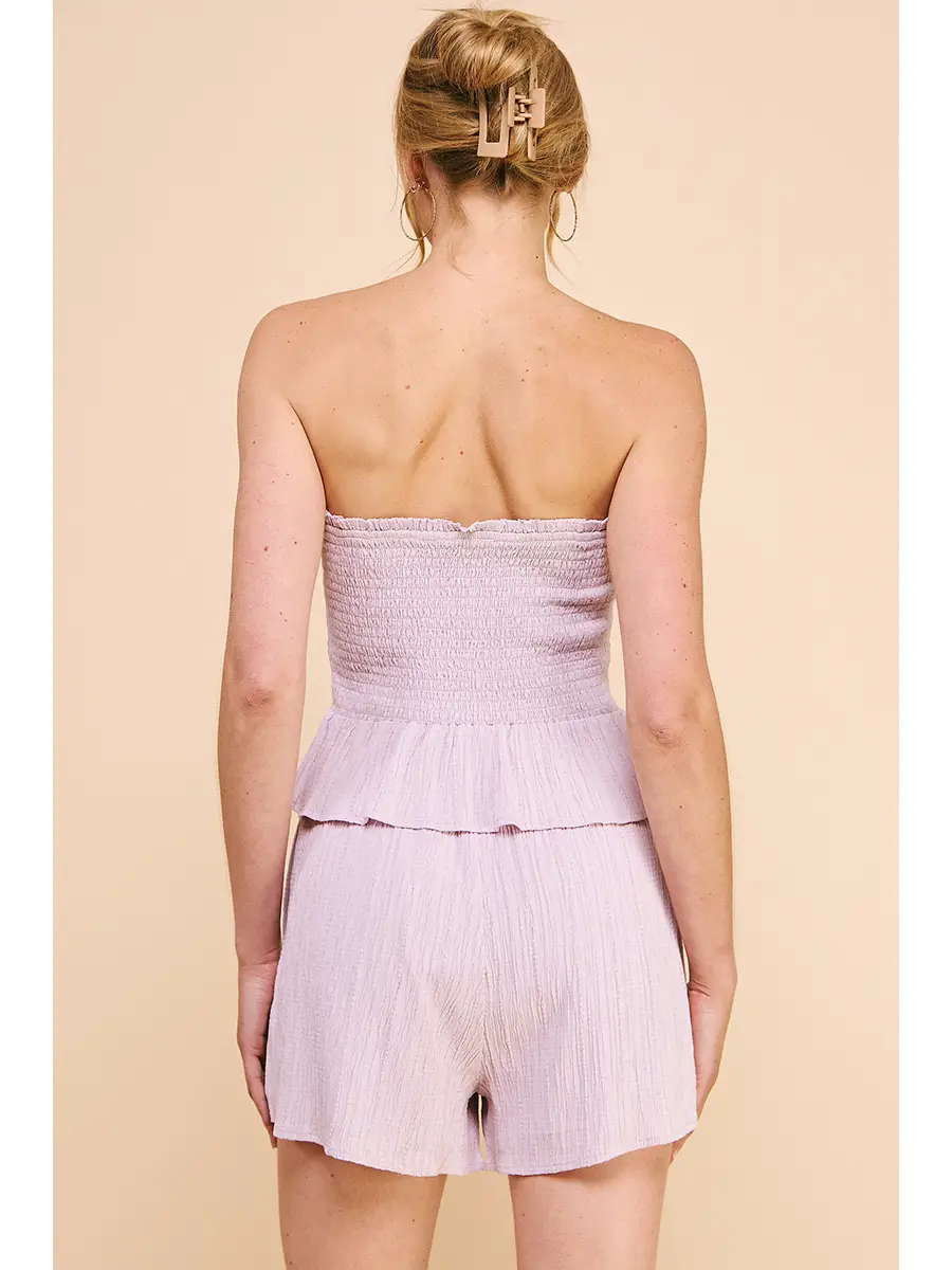TEXTURED SMOCKED STRAPLESS PEPLUM TOP