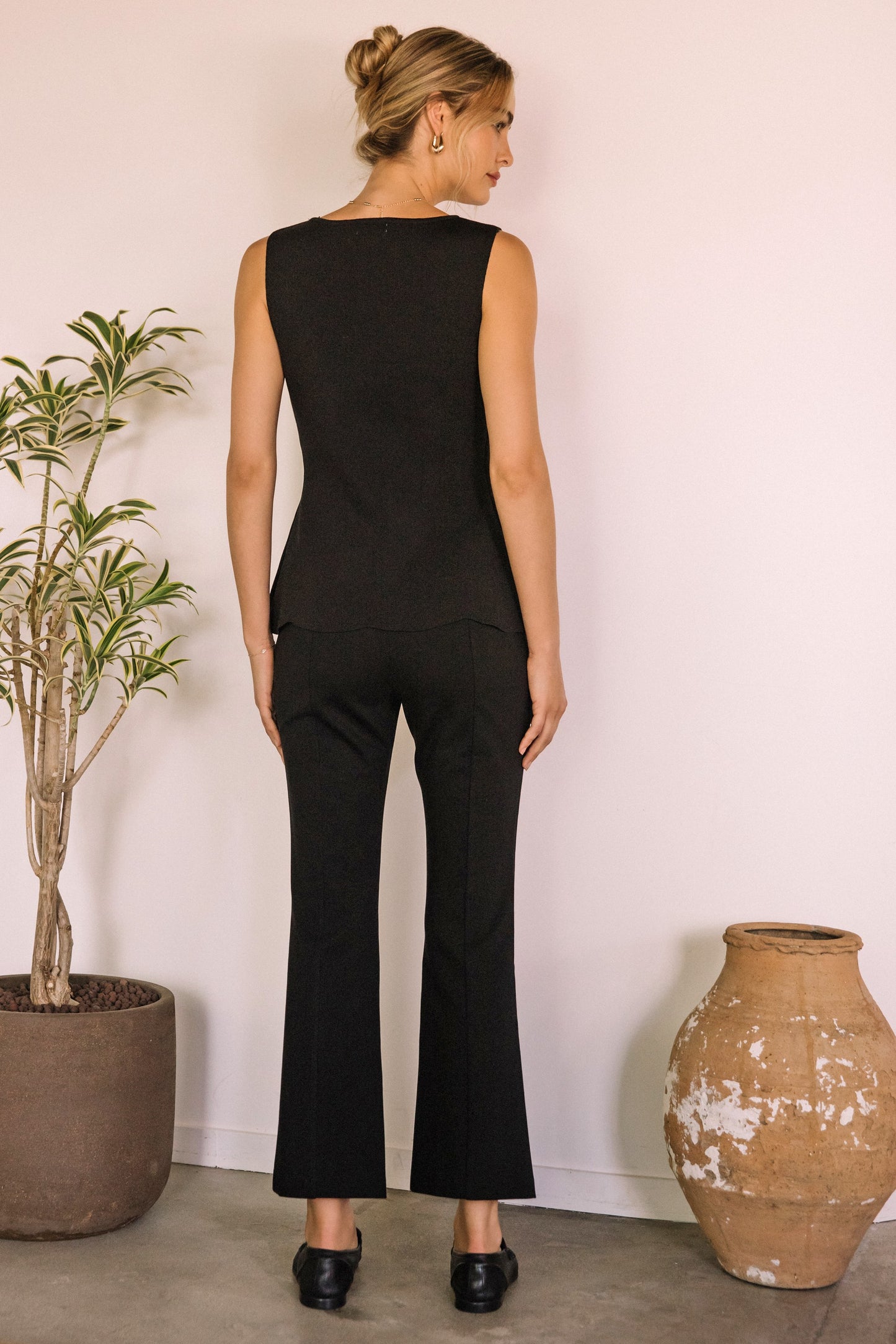 SLEEVELESS KNIT PEPLUM TOP