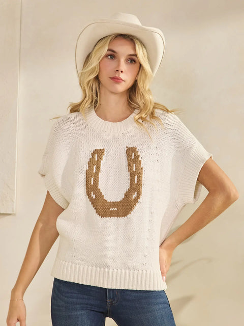 Model wearing cream and mocha western horseshoe sweater top