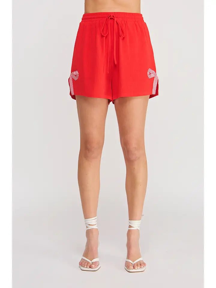LINEN SHORTS W/ BOW HEM
