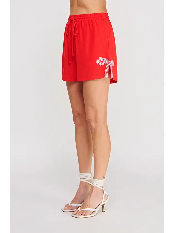 LINEN SHORTS W/ BOW HEM