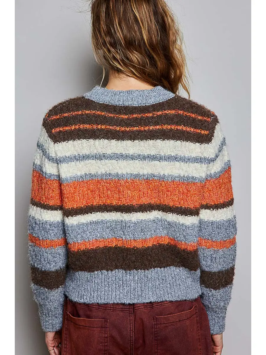 Chunky multicolor striped crew sweater on model, back view