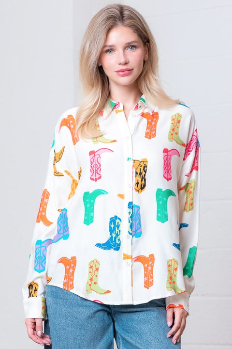 Model wearing western boot-print button-up shirt