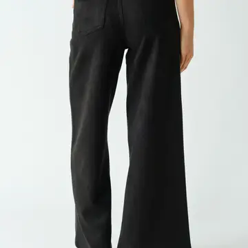Black faux-suede pants waistband and pocket detail