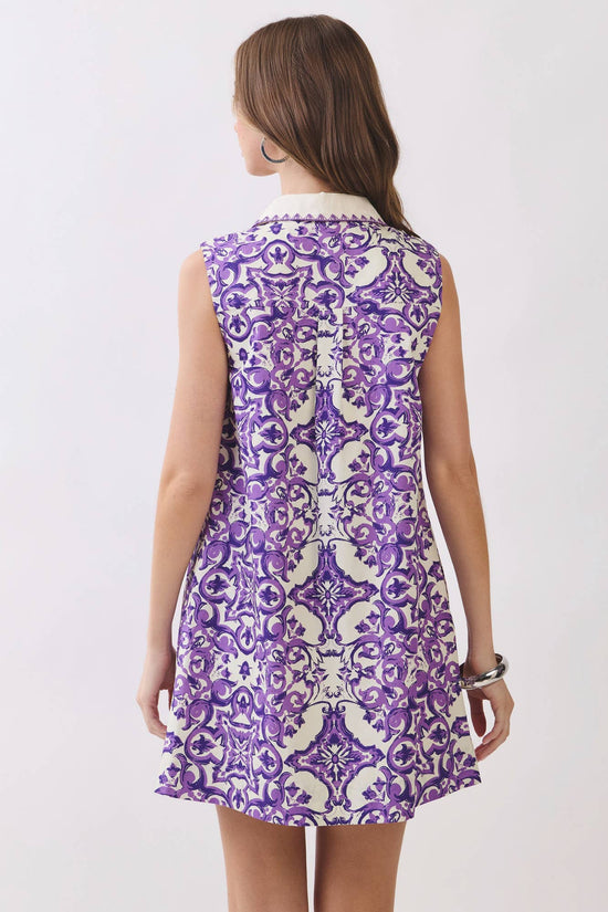 Back view of purple tile-print collared mini dress