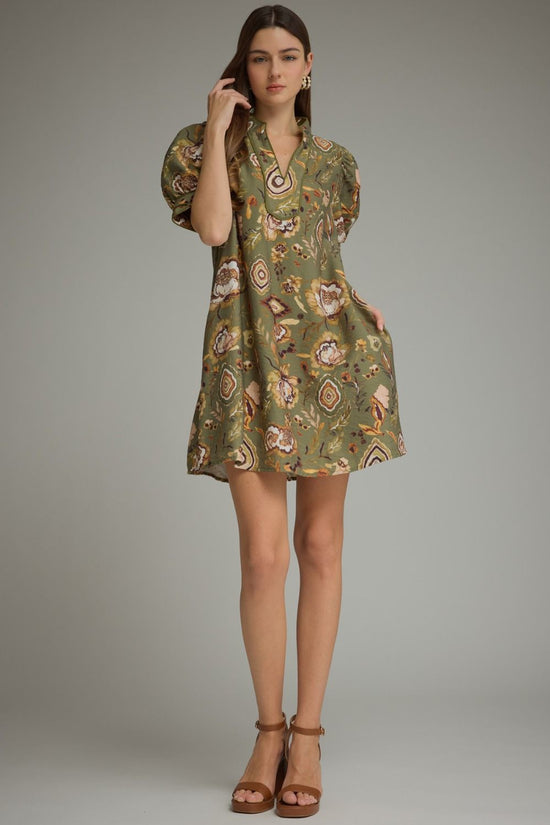 Green botanical mini dress by Entro, back view