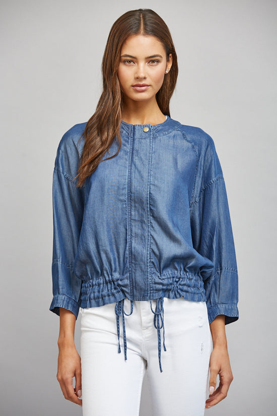 Model wearing dark denim adjustable-hem Tencel jacket