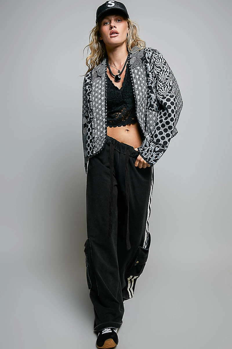Black and ivory quilted kimono jacket styled on model
