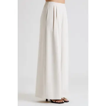 Side view of cream high-rise wide-leg trousers