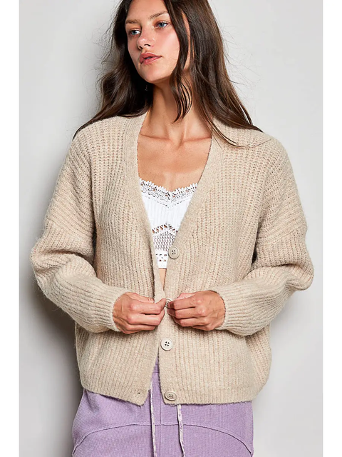 Tan V-neck button-front cardigan on model, front view