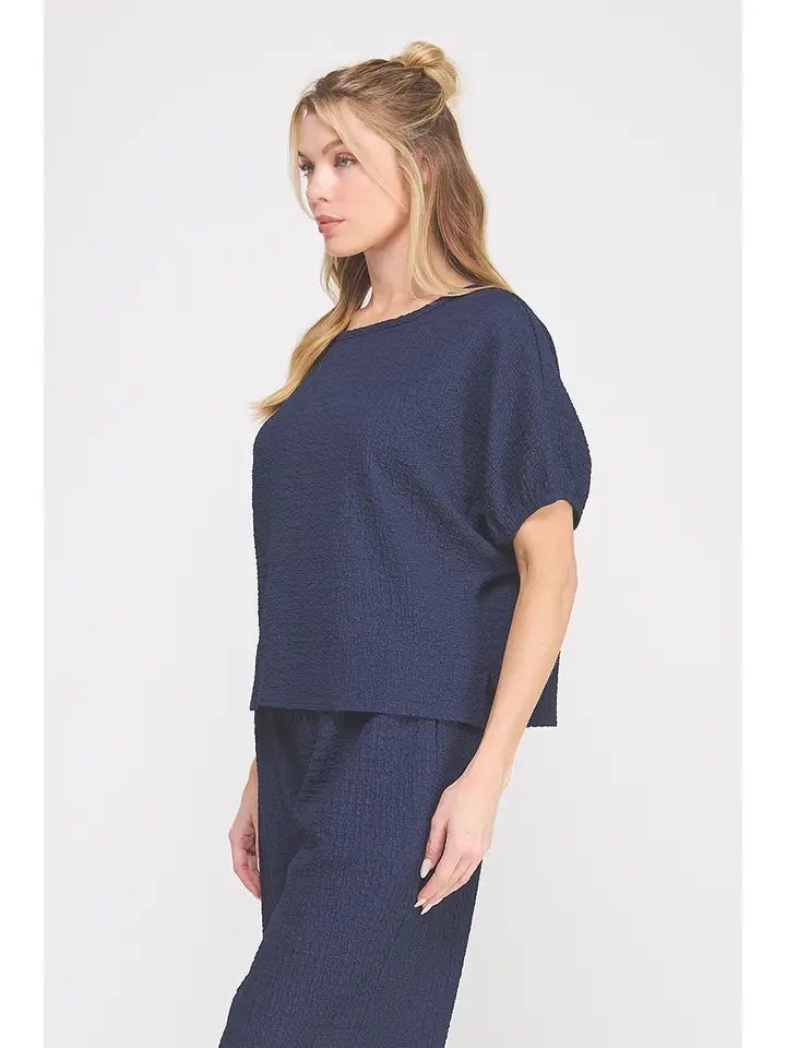 TEXTURED KNIT DOLMAN TOP