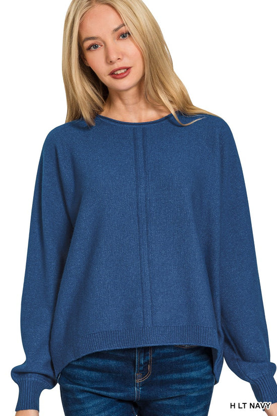 Model wearing front-seam round-neck sweater