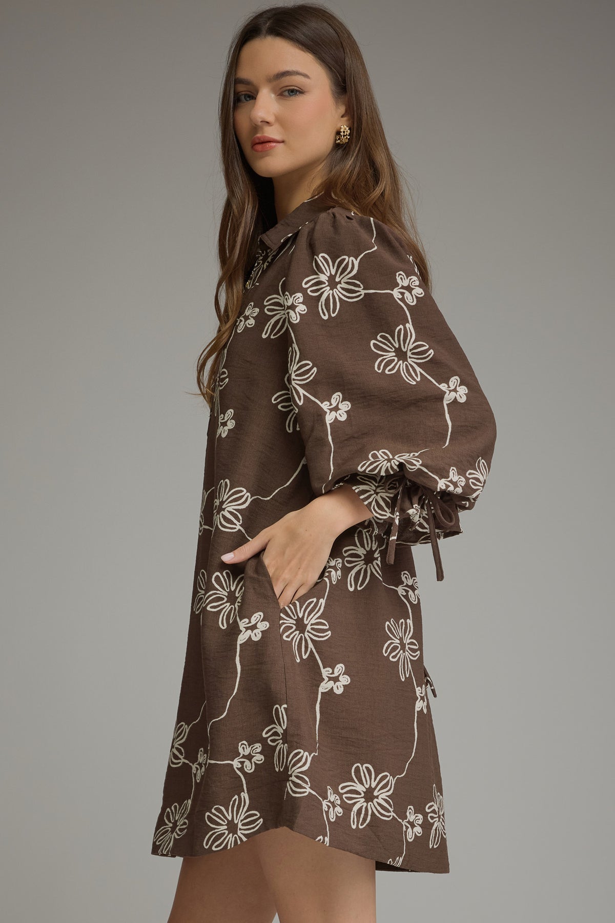 Brown floral balloon-sleeve mini dress, side view