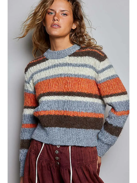 Chunky multicolor striped crew sweater on model, front view
