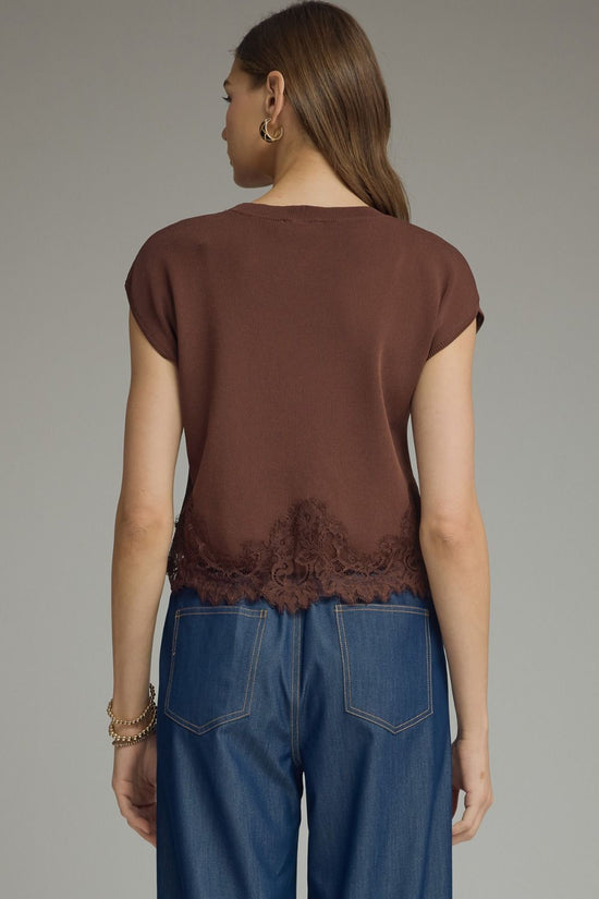 Back view of brown knit top with cap sleeves and tonal scalloped floral-lace hem