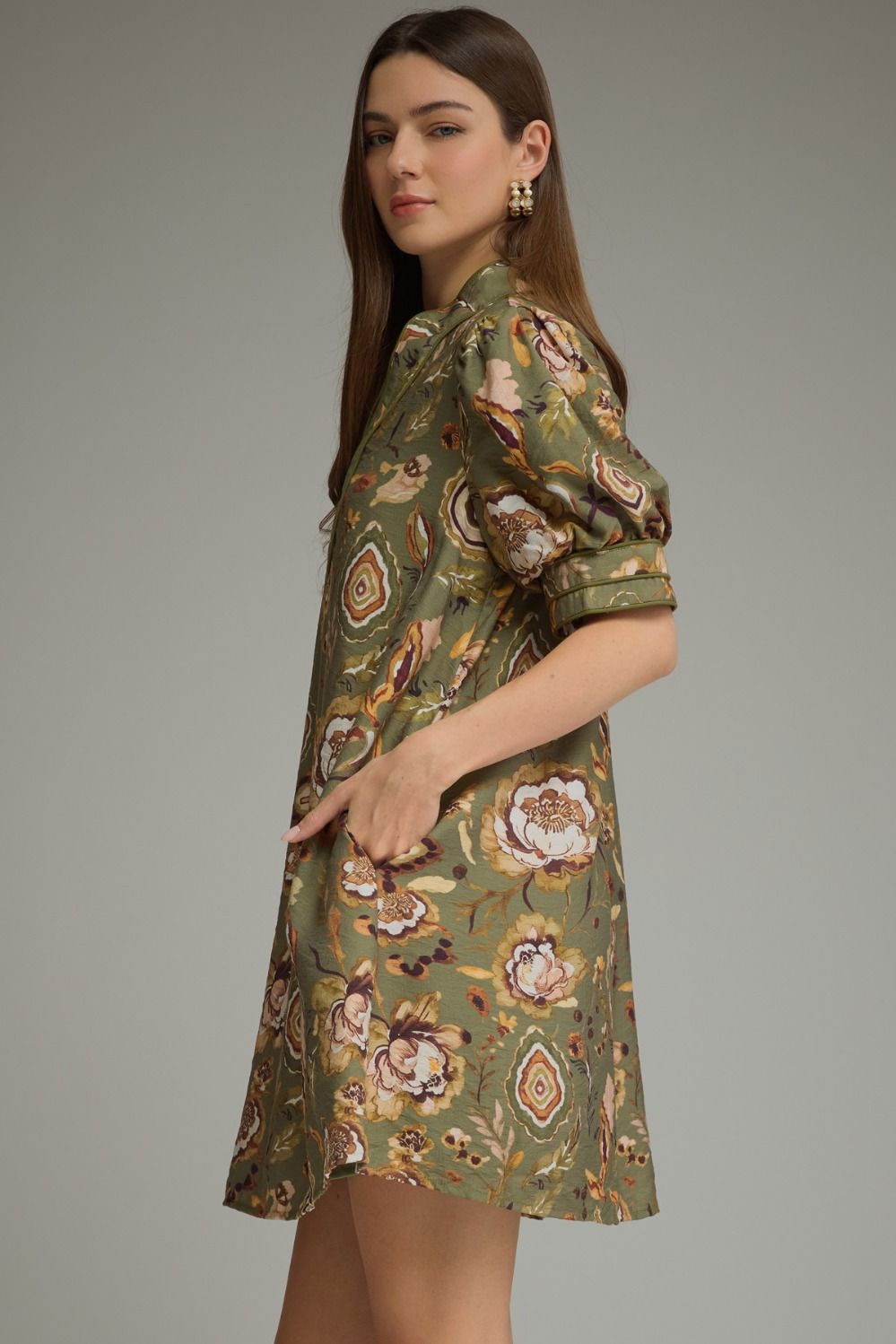 Green botanical mini dress by Entro, styled view