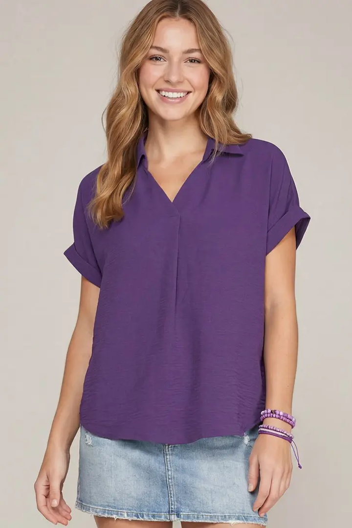 Purple collared top with relaxed drop shoulders, front view