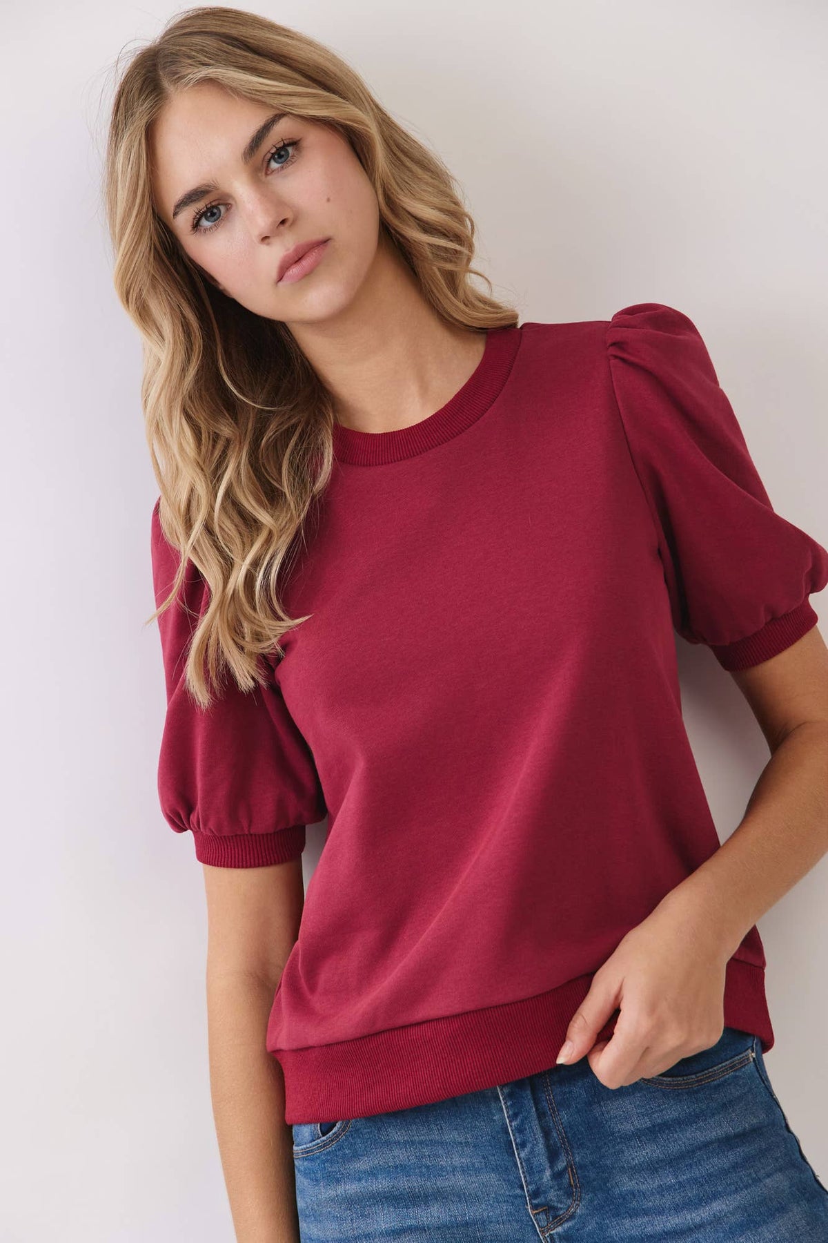 Red puff-sleeve cotton knit top by TCEC, front view