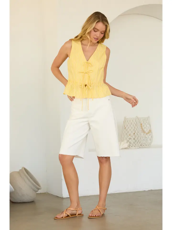 SLEEVELESS TIE FRONT PEPLUM