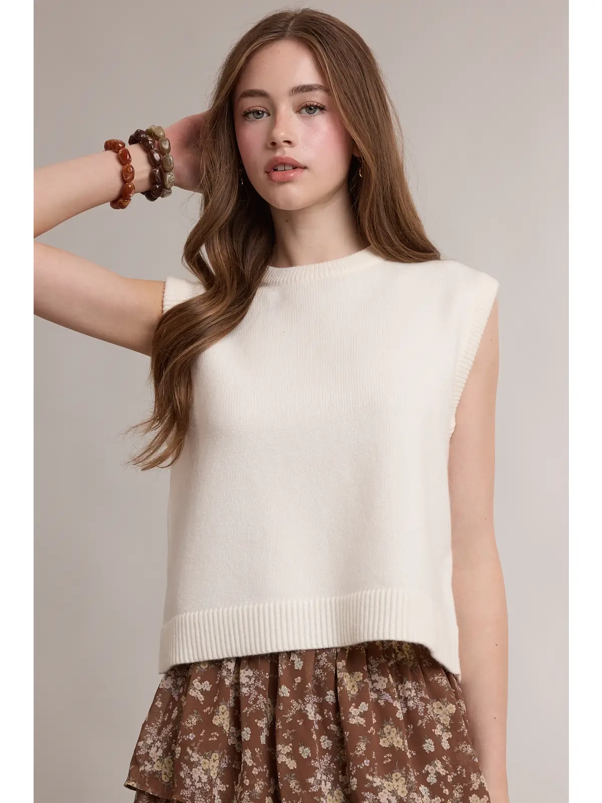 Ivory relaxed sleeveless sweater vest, front view