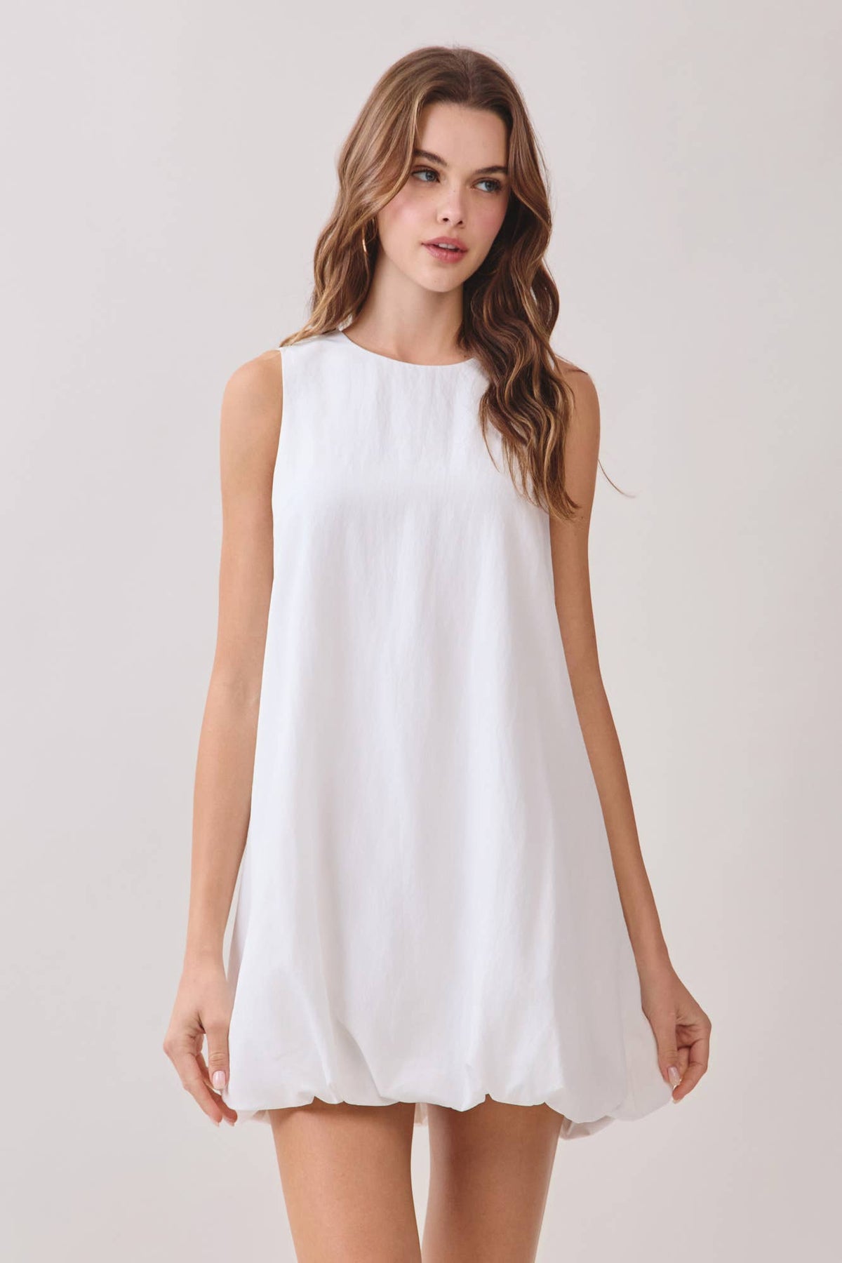 White open-back bubble-hem mini dress by TCEC, front view