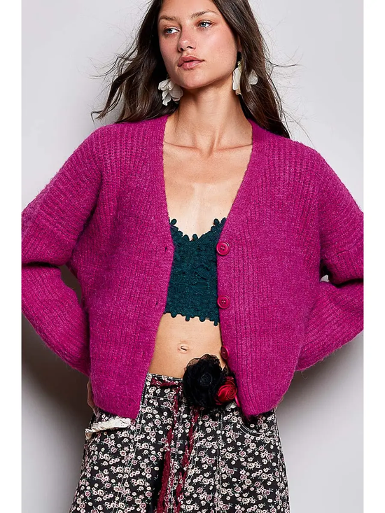Pink V-neck button-front cardigan on model, front view