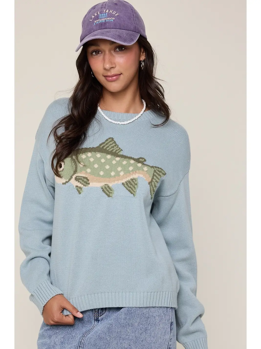 Light blue fish graphic crewneck sweater, front view