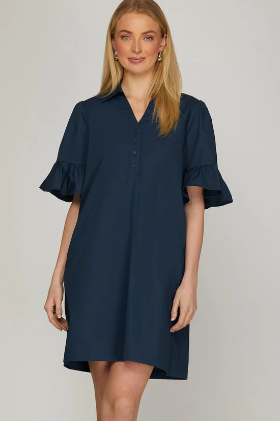 Navy bell sleeve mini dress, front studio view