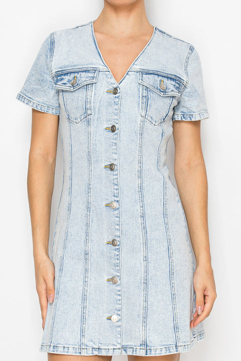 Model wearing light blue denim button-up mini dress