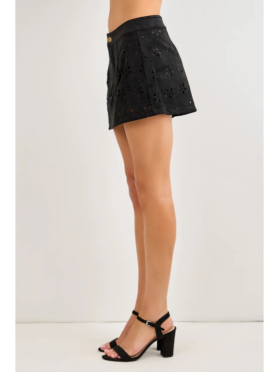 Black floral laser-cut skort on model, side view