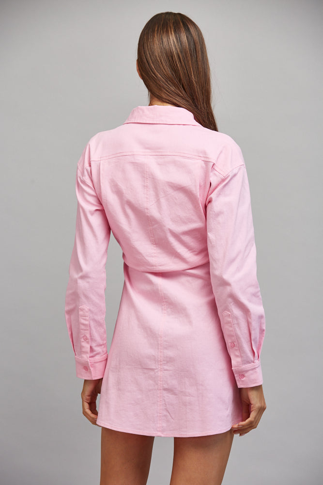 Pink A-line mini dress, side styling view
