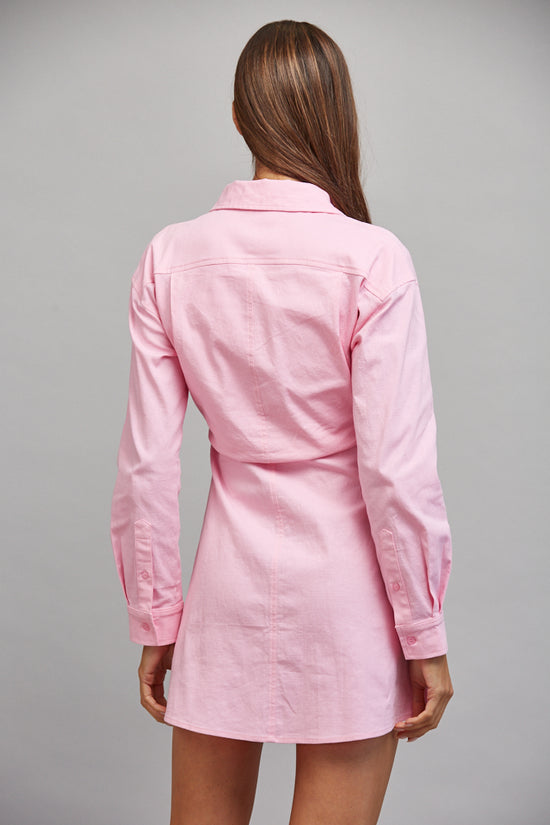 Pink A-line mini dress, side styling view