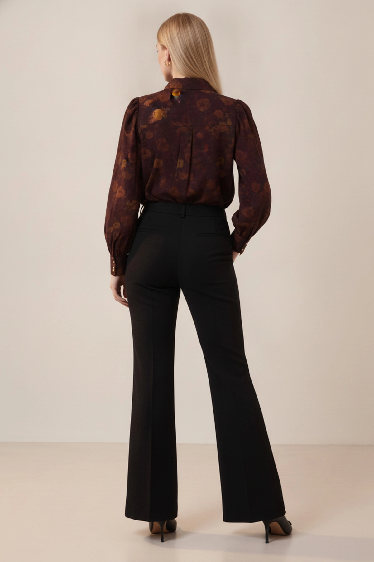 Burgundy floral blouse back view with gathered shoulder detail