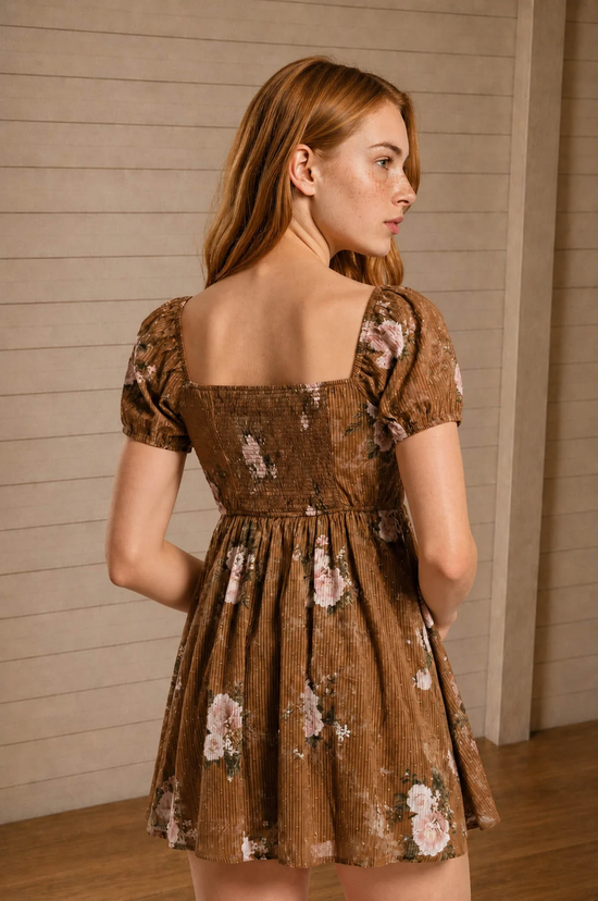 Brown floral sweetheart dress styled for an event