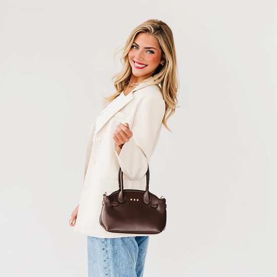 Veronica small tote in brown shown for scale with top handles