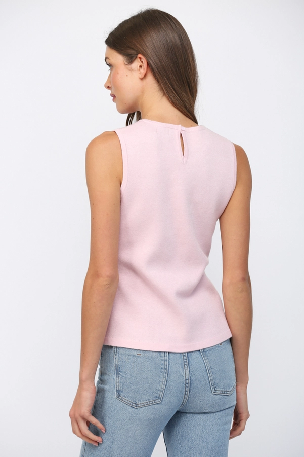 FLORAL JACQUARD PEPLUM KNIT TOP