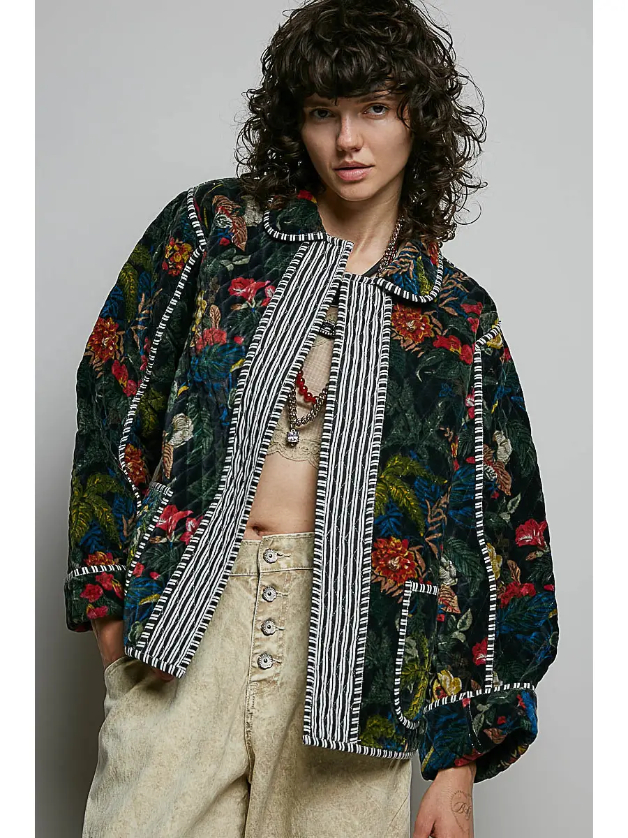 Black floral quilted open-front jacket on model, front view