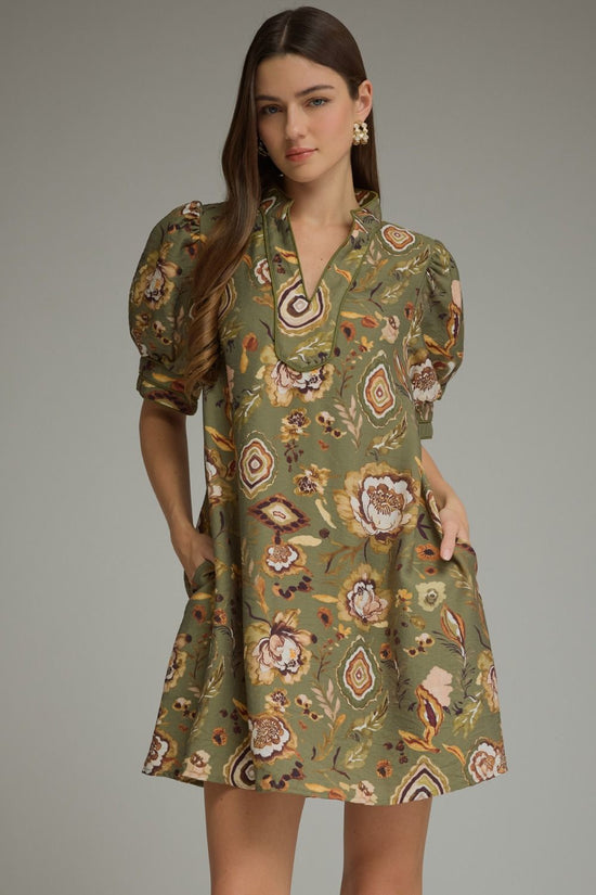 Green botanical split-neck mini dress by Entro, front view