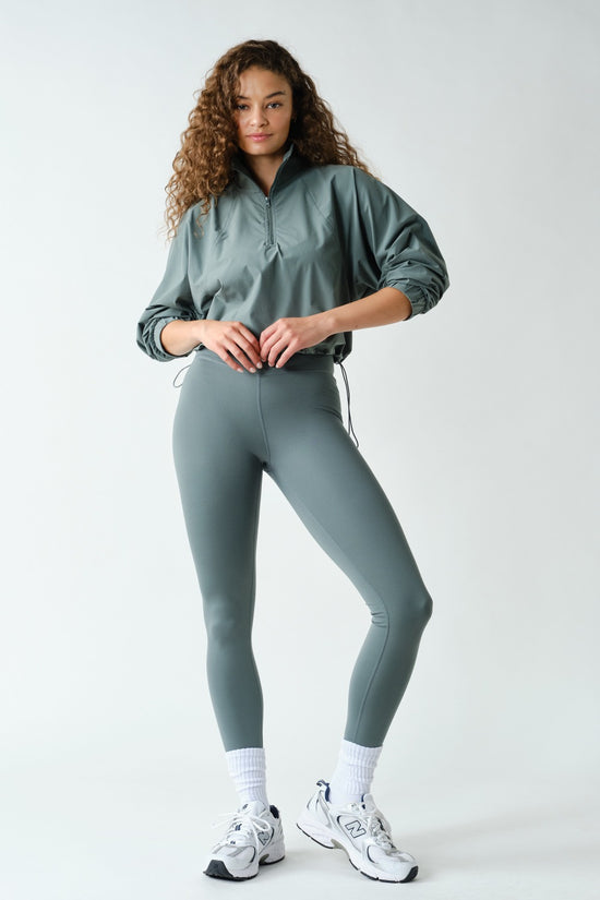 Green Novaflex pullover - adjustable drawcord hem detail