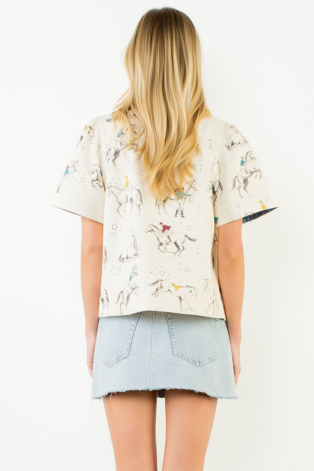 Cream horse-motif cotton top, back view