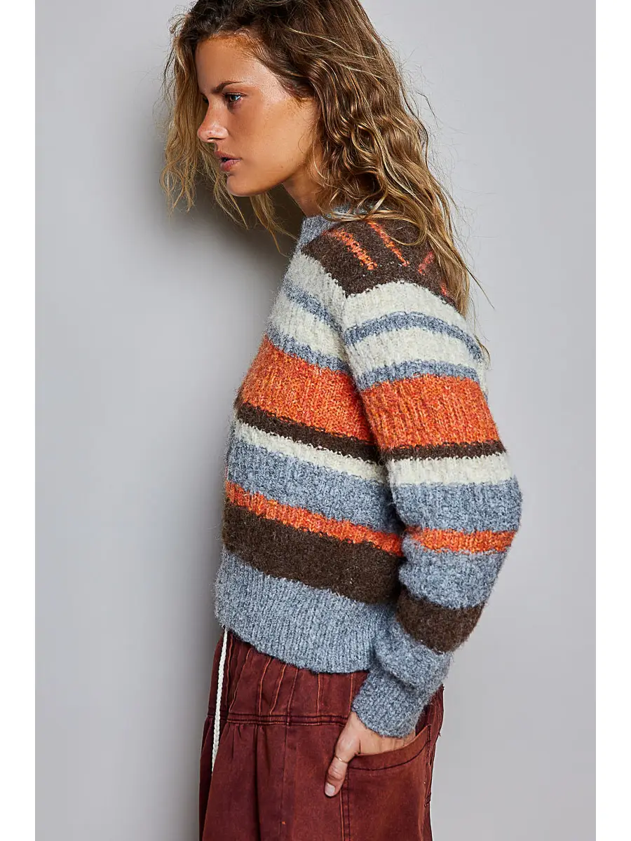 Chunky striped crew sweater showing the cropped side fit