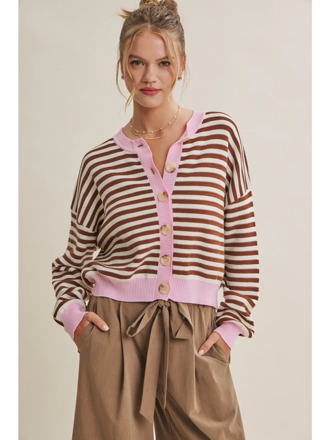 Brown and cream striped cardigan with pink ribbed trim and button front, close-up