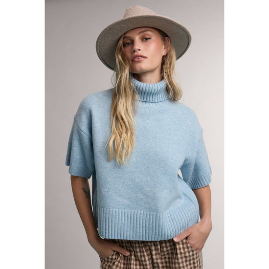 Light blue short-sleeve turtleneck sweater, front view