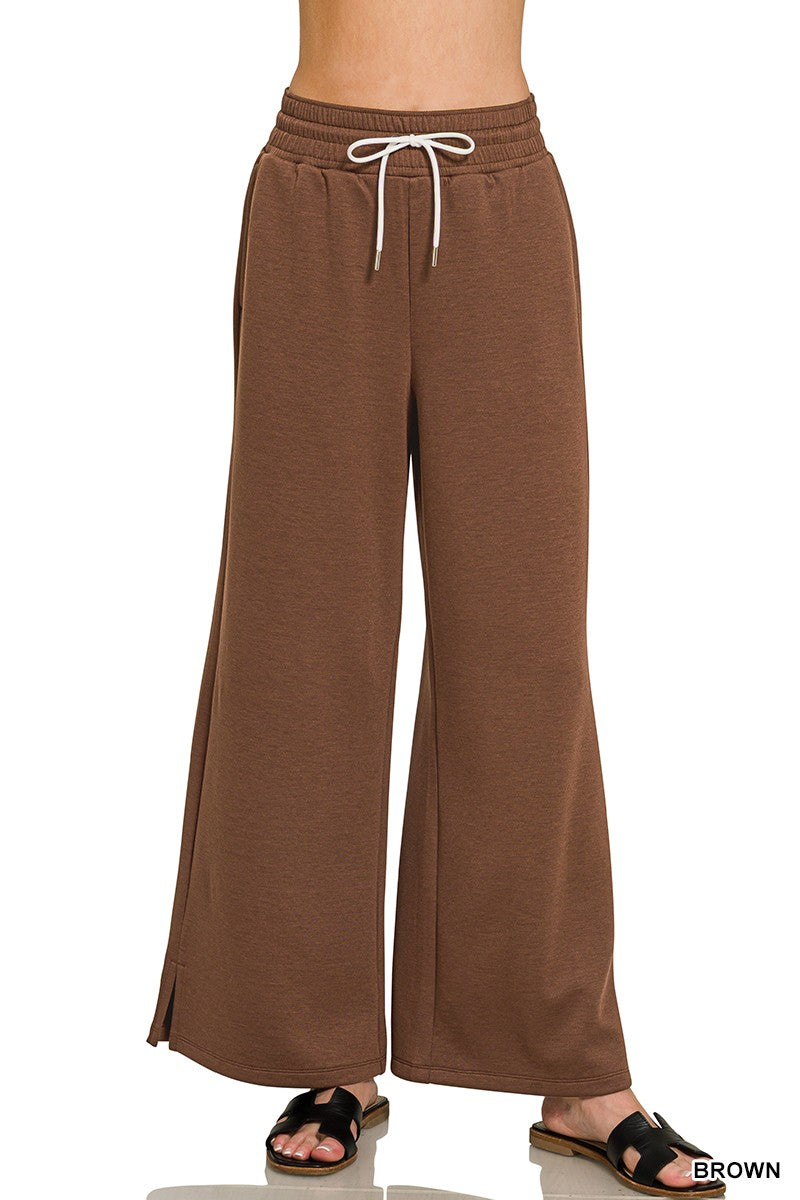 Brown cloud-fleece drawstring pants with a wide-leg fit