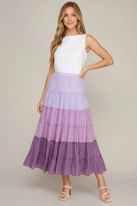 Model wearing purple ombre tiered maxi skirt